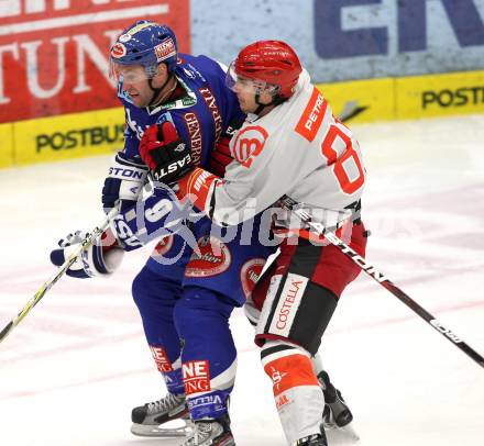 EBEL. Eishockey Bundesliga. EC Rekord Fenster VSV gegen HK Jesenice.  Tomaz Razingar,  (VSV), Luka Tosic (HK Jesenice). Villach, am 27.11.2011.
Foto: Kuess 


---
pressefotos, pressefotografie, kuess, qs, qspictures, sport, bild, bilder, bilddatenbank