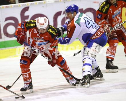 EBEL. Eishockey Bundesliga. KAC gegen KHL Medvescak Zagreb. Thomas Koch,  (KAC), David Brine (Zagreb). Klagenfurt, am 2.12.2011.
Foto: Kuess

---
pressefotos, pressefotografie, kuess, qs, qspictures, sport, bild, bilder, bilddatenbank