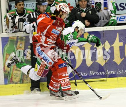 EBEL. Eishockey Bundesliga. KAC gegen HDD TILIA Olimpija Ljubljana. BRANDNER Christoph (KAC), TAYLOR Justin (Laibach). Klagenfurt, am 6.12.2011.
Foto: Kuess

---
pressefotos, pressefotografie, kuess, qs, qspictures, sport, bild, bilder, bilddatenbank
