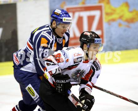 Eishockey Oesterreich Cup. Oesterreich gegen Slowakei. Manuel Geier, (Oesterreich), Kristian Kudroc  (Slowakei). Klagenfurt, 17.12.2011.
Foto: Kuess

---
pressefotos, pressefotografie, kuess, qs, qspictures, sport, bild, bilder, bilddatenbank