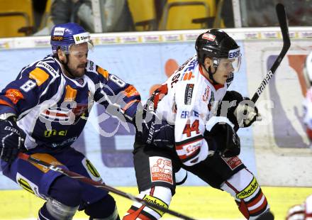 Eishockey Oesterreich Cup. Oesterreich gegen Slowakei. Stephan Geier, (Oesterreich), Martin Cibak  (Slowakei). Klagenfurt, 17.12.2011.
Foto: Kuess

---
pressefotos, pressefotografie, kuess, qs, qspictures, sport, bild, bilder, bilddatenbank