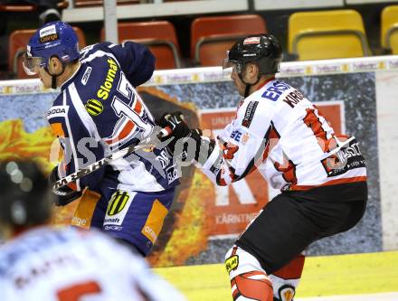 Eishockey Oesterreich Cup. Oesterreich gegen Slowakei.  Johannes Kirisits, (Oesterreich), Vladimir Dravecky (Slowakei). Klagenfurt, 17.12.2011.
Foto: Kuess

---
pressefotos, pressefotografie, kuess, qs, qspictures, sport, bild, bilder, bilddatenbank