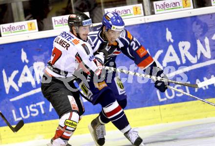 Eishockey Oesterreich Cup. Oesterreich gegen Slowakei. Stefan Ulmer, (Oesterreich), Radoslav Tybor  (Slowakei). Klagenfurt, 17.12.2011.
Foto: Kuess

---
pressefotos, pressefotografie, kuess, qs, qspictures, sport, bild, bilder, bilddatenbank