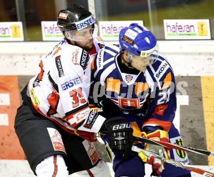 Eishockey Oesterreich Cup. Oesterreich gegen Slowakei.  Martin Oraze, (Oesterreich), Radoslav Tybor (Slowakei). Klagenfurt, 17.12.2011.
Foto: Kuess

---
pressefotos, pressefotografie, kuess, qs, qspictures, sport, bild, bilder, bilddatenbank