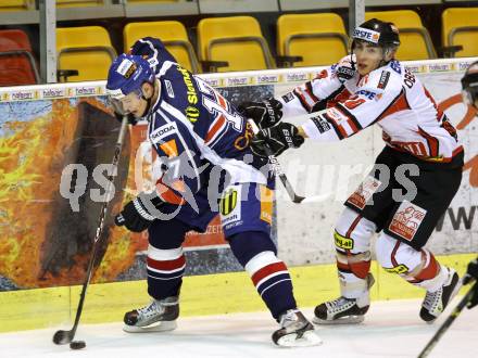 Eishockey Oesterreich Cup. Oesterreich gegen Slowakei. Daniel Innerkofler,  (Oesterreich), Vladimir Dravecky (Slowakei). Klagenfurt, 17.12.2011.
Foto: Kuess

---
pressefotos, pressefotografie, kuess, qs, qspictures, sport, bild, bilder, bilddatenbank