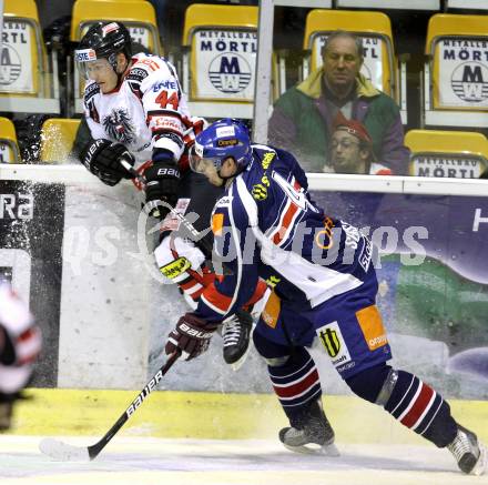 Eishockey Oesterreich Cup. Oesterreich gegen Slowakei. Stephan Geier,  (Oesterreich), Michal Sersen (Slowakei). Klagenfurt, 17.12.2011.
Foto: Kuess

---
pressefotos, pressefotografie, kuess, qs, qspictures, sport, bild, bilder, bilddatenbank