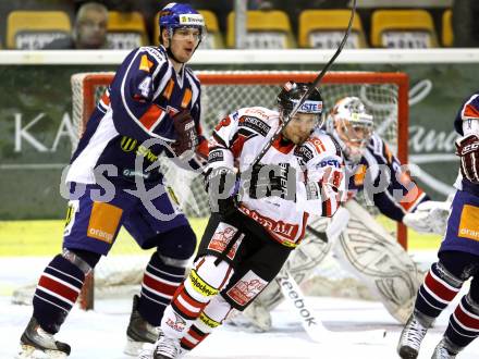 Eishockey Oesterreich Cup. Oesterreich gegen Slowakei. Thomas Koch,  (Oesterreich), Michal Sersen (Slowakei). Klagenfurt, 17.12.2011.
Foto: Kuess

---
pressefotos, pressefotografie, kuess, qs, qspictures, sport, bild, bilder, bilddatenbank
