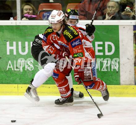 EBEL. Eishockey Bundesliga. KAC gegen HC Orli Znojmo. HUNDERTPFUND Thomas (KAC), BARTOS David (Znojmo). Klagenfurt, am 20.12.2011.
Foto: Kuess

---
pressefotos, pressefotografie, kuess, qs, qspictures, sport, bild, bilder, bilddatenbank