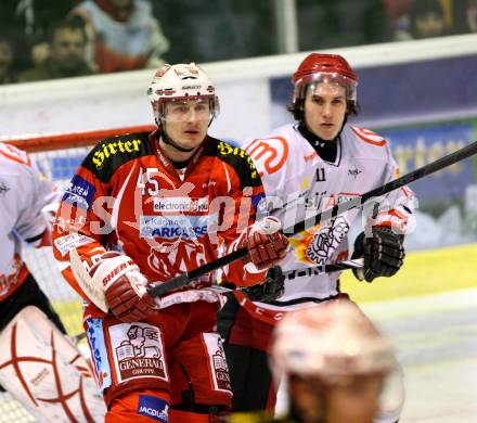 EBEL. Eishockey Bundesliga. KAC gegen HK Acroni Jesenice. SCHULLER David (KAC), GRAHUT Ziga (Jesenice). Klagenfurt, am 6.1.2012.
Foto: Kuess

---
pressefotos, pressefotografie, kuess, qs, qspictures, sport, bild, bilder, bilddatenbank