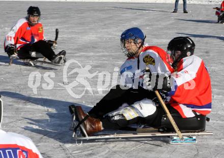 Behindertensport. Sledgehockey. Vergleichskampf Kaernten gegen St. Poelten. Rauschele See, am 21.1.2012.
Foto: Kuess
---
pressefotos, pressefotografie, kuess, qs, qspictures, sport, bild, bilder, bilddatenbank