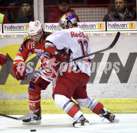 EBEL. Eishockey Bundesliga. KAC gegen EC Red Bull Salzburg. Thomas Koch, (KAC), Michael Schiechl (Salzburg). Klagenfurt, am 21.2.2012.
Foto: Kuess

---
pressefotos, pressefotografie, kuess, qs, qspictures, sport, bild, bilder, bilddatenbank