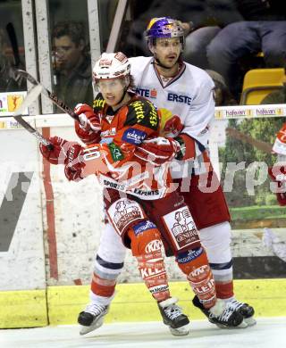 EBEL. Eishockey Bundesliga. KAC gegen EC Red Bull Salzburg. Tyler Scofield, (KAC), Manuel Latusa (Salzburg). Klagenfurt, am 21.2.2012.
Foto: Kuess

---
pressefotos, pressefotografie, kuess, qs, qspictures, sport, bild, bilder, bilddatenbank