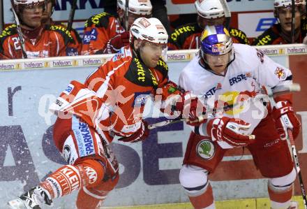 EBEL. Eishockey Bundesliga. KAC gegen EC Red Bull Salzburg. Joseph Joey Tenute, (KAC), Markus Schlacher (Salzburg). Klagenfurt, am 21.2.2012.
Foto: Kuess

---
pressefotos, pressefotografie, kuess, qs, qspictures, sport, bild, bilder, bilddatenbank