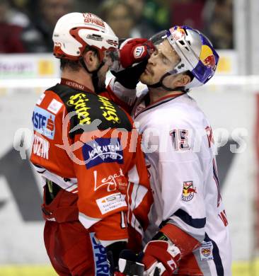 EBEL. Eishockey Bundesliga. KAC gegen EC Red Bull Salzburg. Andrei Zyuzin, (KAC), Manuel Latusa (Salzburg). Klagenfurt, am 21.2.2012.
Foto: Kuess

---
pressefotos, pressefotografie, kuess, qs, qspictures, sport, bild, bilder, bilddatenbank