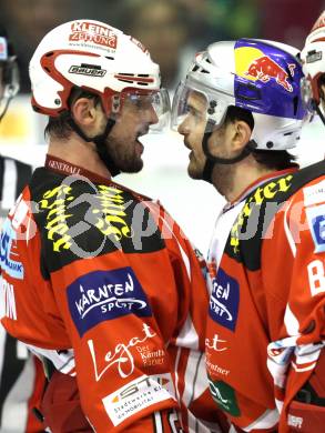 EBEL. Eishockey Bundesliga. KAC gegen EC Red Bull Salzburg. Andrei Zyuzin, (KAC), Manuel Latusa (Salzburg). Klagenfurt, am 21.2.2012.
Foto: Kuess

---
pressefotos, pressefotografie, kuess, qs, qspictures, sport, bild, bilder, bilddatenbank