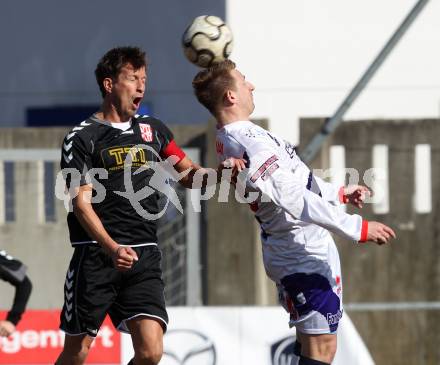 Fussball Regionalliga. SAK gegen St. Florian. Darijo Biscan (SAK), Thomas Groebl (St. Florian). Klagenfurt, am 10.3.2012.
Foto: Kuess
---
pressefotos, pressefotografie, kuess, qs, qspictures, sport, bild, bilder, bilddatenbank