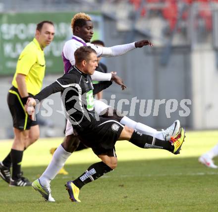Fussball Regionalliga. SK Austria Klagenfurt gegen Sturm Graz Amateure. 
Kevin Guy Roland Bangai Bough, (Klagenfurt), Christoph Kroepfl (Graz). Klagenfurt, 1.4.2012.
Foto: Kuess
---
pressefotos, pressefotografie, kuess, qs, qspictures, sport, bild, bilder, bilddatenbank