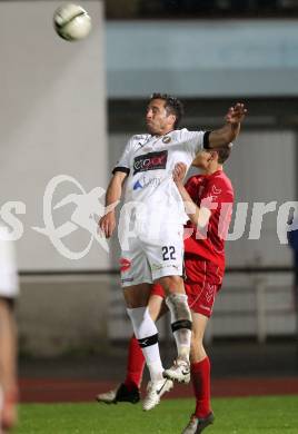 Fussball. Regionalliga.  VSV gegen St. Florian. Darko Djukic, (VSV), Dominic Winkler (St. Florian). Villach, 5.4.2012. 
Foto: Kuess

---
pressefotos, pressefotografie, kuess, qs, qspictures, sport, bild, bilder, bilddatenbank