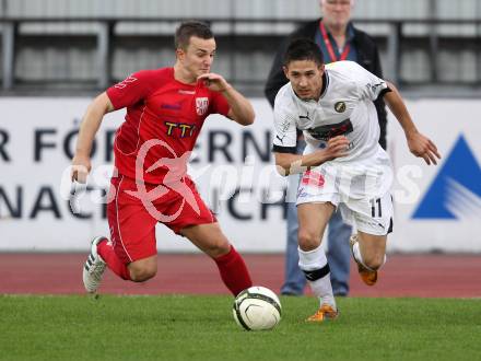 Fussball. Regionalliga.  VSV gegen St. Florian. Paul Jury, (VSV), Florian Gahleitner  (St. Florian). Villach, 5.4.2012. 
Foto: Kuess

---
pressefotos, pressefotografie, kuess, qs, qspictures, sport, bild, bilder, bilddatenbank