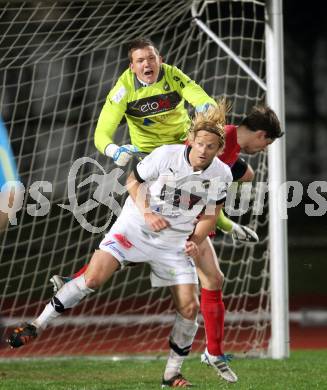 Fussball. Regionalliga.  VSV gegen St. Florian. Patrick Boeck, Johannes Isopp,  (VSV), Markus Hermes (St. Florian). Villach, 5.4.2012. 
Foto: Kuess

---
pressefotos, pressefotografie, kuess, qs, qspictures, sport, bild, bilder, bilddatenbank