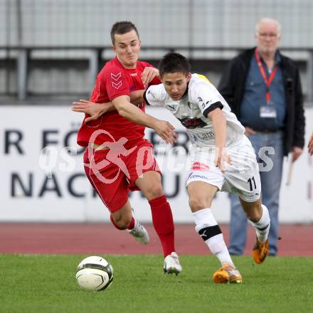 Fussball. Regionalliga.  VSV gegen St. Florian. Paul Jury, (VSV),  Florian Gahleitner (St. Florian). Villach, 5.4.2012. 
Foto: Kuess

---
pressefotos, pressefotografie, kuess, qs, qspictures, sport, bild, bilder, bilddatenbank