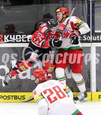 Eishockey Laenderspiel. Oesterreich gegen Weissrussland. Patrick Harand,  (Oesterreich), Viktor Kostyuchonok (Weissrussland). Klagenfurt, am 6.4.2012.
Foto: Kuess

---
pressefotos, pressefotografie, kuess, qs, qspictures, sport, bild, bilder, bilddatenbank