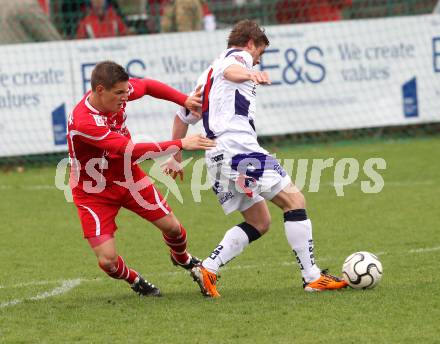 Fussball Regionalliga. SAK gegen Vorwaerts Steyr. Grega Triplat (SAK), Ernst Merkinger (Steyr). Klagenfurt, am 7.4.2012.
Foto: Kuess
---
pressefotos, pressefotografie, kuess, qs, qspictures, sport, bild, bilder, bilddatenbank