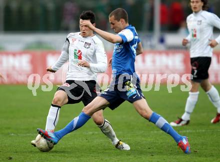 Fussball. Erste Liga.  WAC/St. Andrae gegen FC Lustenau. Roland Putsche,  (WAC), Christian Haselberger (Lustenau). Wolfsberg, 17.4.2012. 
Foto: Kuess

---
pressefotos, pressefotografie, kuess, qs, qspictures, sport, bild, bilder, bilddatenbank
