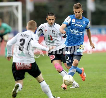 Fussball. Erste Liga.  WAC/St. Andrae gegen FC Lustenau. Nenad Jovanovic, (WAC), Lukas HInterseer (Lustenau). Wolfsberg, 17.4.2012. 
Foto: Kuess

---
pressefotos, pressefotografie, kuess, qs, qspictures, sport, bild, bilder, bilddatenbank