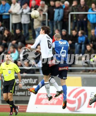 Fussball. Erste Liga.  WAC/St. Andrae gegen FC Lustenau. Christian Falk, (WAC), Dennis Mimm (Lustenau). Wolfsberg, 17.4.2012. 
Foto: Kuess

---
pressefotos, pressefotografie, kuess, qs, qspictures, sport, bild, bilder, bilddatenbank