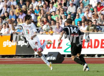 Fussball. Erste Liga.  WAC/St. Andrae gegen TSV Hartberg. Jacobo, (WAC), Manuel Prietl  (Hartberg). Wolfsberg, 8.5.2012. 
Foto: Kuess

---
pressefotos, pressefotografie, kuess, qs, qspictures, sport, bild, bilder, bilddatenbank