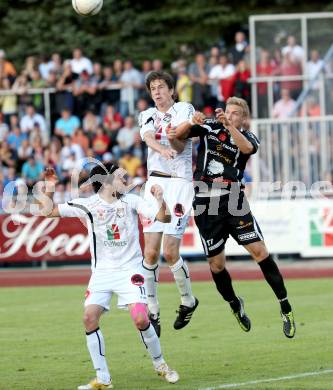 Fussball. Erste Liga.  WAC/St. Andrae gegen TSV Hartberg. Christian Falk, Jacobo, (WAC), Michael Huber (Hartberg). Wolfsberg, 8.5.2012. 
Foto: Kuess

---
pressefotos, pressefotografie, kuess, qs, qspictures, sport, bild, bilder, bilddatenbank