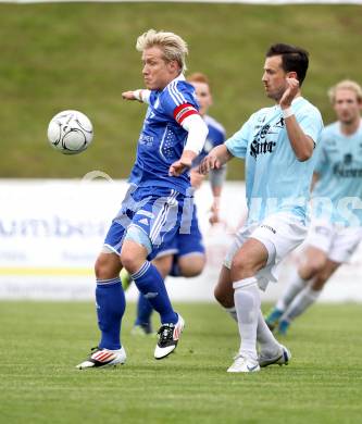 Fussball Kaerntner Liga. St. Veit gegen Treibach. Bernhard Kitz, (St. Veit), Alexander Lessnigg (Treibach). St. Veit, am 16.5.2012.
Foto: Kuess
---
pressefotos, pressefotografie, kuess, qs, qspictures, sport, bild, bilder, bilddatenbank