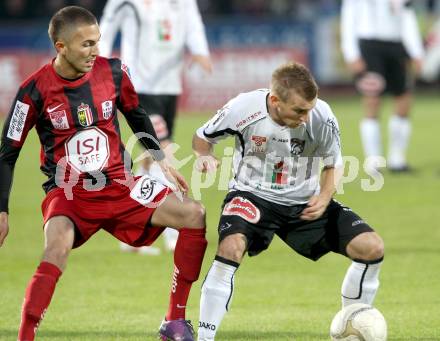 Fussball. Erste Liga.  WAC/St. Andrae gegen LASK Linz. Manuel Kerhe,  (WAC), Ali Hamdemir (LASK). Wolfsberg, 18.5.2012. 
Foto: Kuess

---
pressefotos, pressefotografie, kuess, qs, qspictures, sport, bild, bilder, bilddatenbank