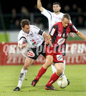 Fussball. Erste Liga.  WAC/St. Andrae gegen LASK Linz. Gernot Messner, (WAC), Johannes Aigner (LASK). Wolfsberg, 18.5.2012. 
Foto: Kuess

---
pressefotos, pressefotografie, kuess, qs, qspictures, sport, bild, bilder, bilddatenbank