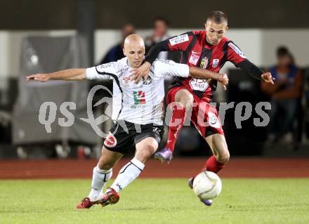 Fussball. Erste Liga.  WAC/St. Andrae gegen LASK Linz. Stephan Stueckler,  (WAC), Ali Hamdemir (LASK). Wolfsberg, 18.5.2012. 
Foto: Kuess

---
pressefotos, pressefotografie, kuess, qs, qspictures, sport, bild, bilder, bilddatenbank