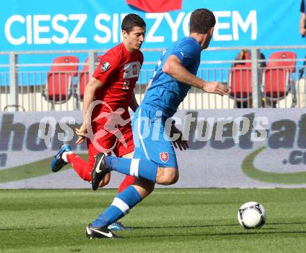 Fussball Laenderspiel. Woerthersee Stadion. Testspiel. Slowakei gegen Polen. Lubomir Michalik,  (Slowakei), Robert Lewandowski (Polen). Klagenfurt, 26.5.2012
Foto: Kuess

---
pressefotos, pressefotografie, kuess, qs, qspictures, sport, bild, bilder, bilddatenbank