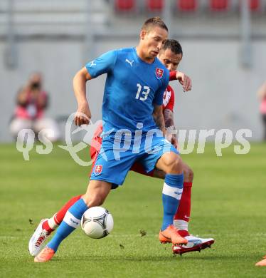 Fussball Laenderspiel. Woerthersee Stadion. Testspiel. Slowakei gegen Polen. Filip Holosko,  (Slowakei), Marcin Wasilewski (Polen). Klagenfurt, 26.5.2012
Foto: Kuess

---
pressefotos, pressefotografie, kuess, qs, qspictures, sport, bild, bilder, bilddatenbank