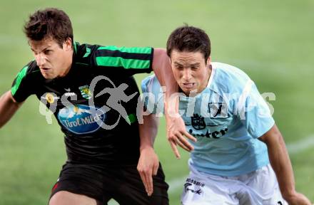 Fussball Kaerntner Liga. FC St. Veit gege Rapid Lienz. Sebastian Hertelt,  (St. Veit), Patrick Eder (Lienz). St. Veit, 26.5.2012.
Foto: Kuess
---
pressefotos, pressefotografie, kuess, qs, qspictures, sport, bild, bilder, bilddatenbank
