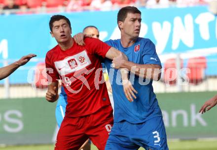 Fussball Laenderspiel. Woerthersee Stadion. Testspiel. Slowakei gegen Polen. Lubomir Michalik, (Slowakei), Robert Lewandowski  (Polen). Klagenfurt, 26.5.2012
Foto: Kuess

---
pressefotos, pressefotografie, kuess, qs, qspictures, sport, bild, bilder, bilddatenbank
