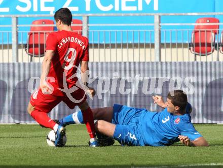 Fussball Laenderspiel. Woerthersee Stadion. Testspiel. Slowakei gegen Polen. Lubomir Michalik,  (Slowakei), Robert Lewandowski (Polen). Klagenfurt, 26.5.2012
Foto: Kuess

---
pressefotos, pressefotografie, kuess, qs, qspictures, sport, bild, bilder, bilddatenbank