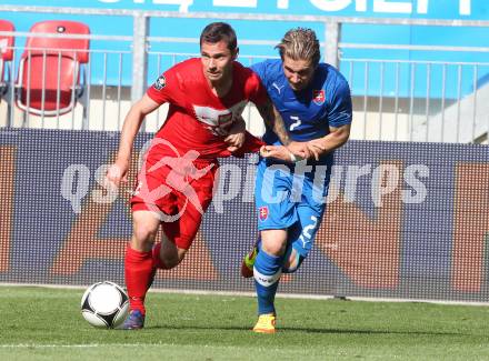 Fussball Laenderspiel. Woerthersee Stadion. Testspiel. Slowakei gegen Polen. Peter Pekarik, (Slowakei), Ludovic Obraniak  (Polen). Klagenfurt, 26.5.2012
Foto: Kuess

---
pressefotos, pressefotografie, kuess, qs, qspictures, sport, bild, bilder, bilddatenbank