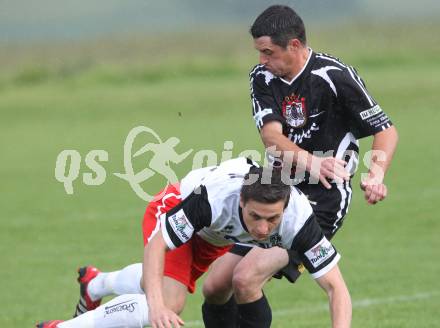 Fussball KFV Cup. SV Kraig gegen SV Spittal/Drau. Thomas Schoeffmann (Kraig), Manuel Plattner (Spittal). Kraig, am 28.5.2012.
Foto: Kuess
---
pressefotos, pressefotografie, kuess, qs, qspictures, sport, bild, bilder, bilddatenbank