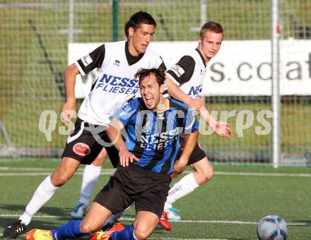 Fussball Kaerntner Liga. Spittal/Drau gegem Drautal. Rafael Graf, (Spittal),  Daniel Trupp  (Drautal).  Spittal 8.6.2012
Foto: Kuess

---
pressefotos, pressefotografie, kuess, qs, qspictures, sport, bild, bilder, bilddatenbank