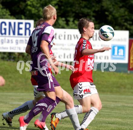 Fussball Bundesliga. Testspiel. SV Feldkirchen gegen Austria Wien. Marco Huber (Feldkirchen), Martin Harrer (Austria Wien). Feldkirchen, am 30.6.2012.
Foto: Kuess

---
pressefotos, pressefotografie, kuess, qs, qspictures, sport, bild, bilder, bilddatenbank
