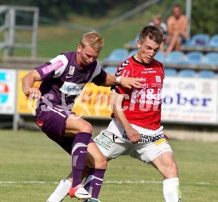 Fussball Bundesliga. Testspiel. SV Feldkirchen gegen Austria Wien. Mathias Regal (Feldkirchen), Martin Harrer (Austria Wien). Feldkirchen, am 30.6.2012.
Foto: Kuess

---
pressefotos, pressefotografie, kuess, qs, qspictures, sport, bild, bilder, bilddatenbank