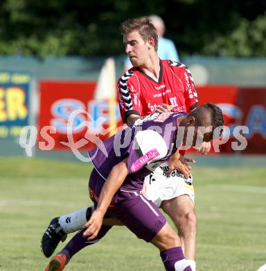 Fussball Bundesliga. Testspiel. SV Feldkirchen gegen Austria Wien. David Hebenstreit (Feldkirchen), Srdan Spiridonovic (Austria Wien). Feldkirchen, am 30.6.2012.
Foto: Kuess

---
pressefotos, pressefotografie, kuess, qs, qspictures, sport, bild, bilder, bilddatenbank