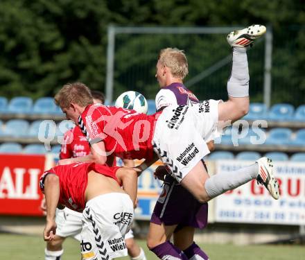 Fussball Bundesliga. Testspiel. SV Feldkirchen gegen Austria Wien. Michael Wernig (Feldkirchen), Martin Harrer (Austria Wien). Feldkirchen, am 30.6.2012.
Foto: Kuess

---
pressefotos, pressefotografie, kuess, qs, qspictures, sport, bild, bilder, bilddatenbank