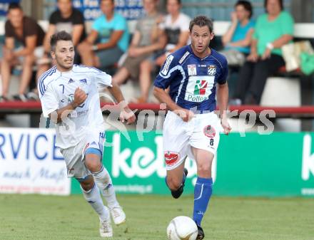 Fussball Testspiel. Treibach gegen RZ Pellets WAC. Svetlozar Angelov,  (Treibach), Gernot Messner (WAC). Treibach, 6.7.2012.
Foto: Kuess
---
pressefotos, pressefotografie, kuess, qs, qspictures, sport, bild, bilder, bilddatenbank