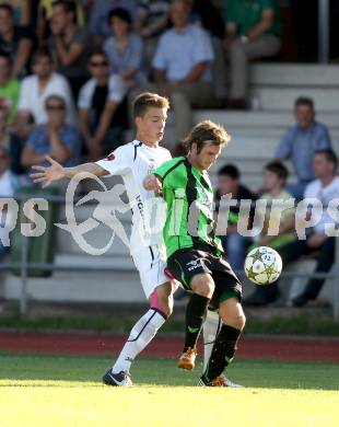 Fussball Freundschaftsspiel. Voelkermarkt gegen RZ Pellets WAC.  Patrick Laschkolnig,  (Voelkermarkt), Maximilian Ritscher (WAC). Voelkermarkt, am 31.7.2012.
Foto: Kuess

---
pressefotos, pressefotografie, kuess, qs, qspictures, sport, bild, bilder, bilddatenbank